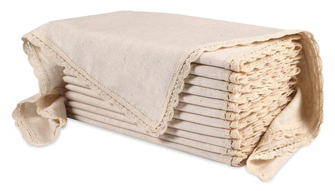 Ramanta Home natural coth dinner napkins folded for a chic table setting, highlighting quality fabric