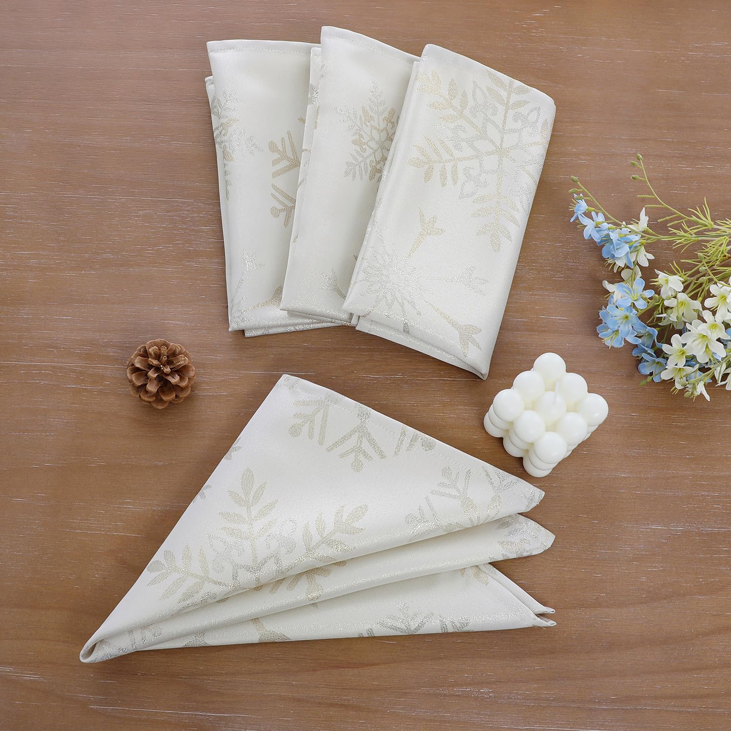 Randall Christmas Snowflake Napkins feature beige base for warm, elegant dining.