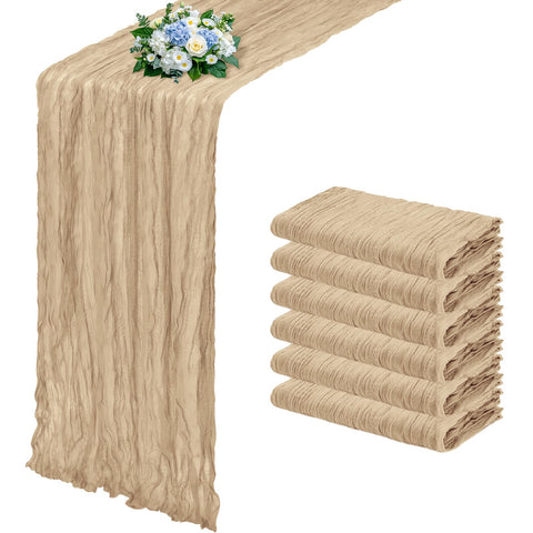 RealBox beige cheesecloth table runner draped on a rustic table for romantic decor
