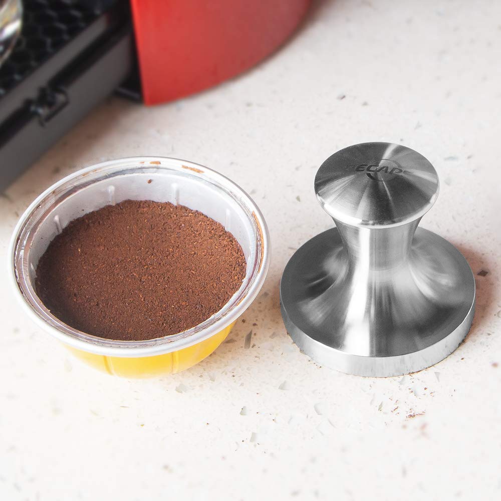 RECAPS included coffee tamper in package ready for use with VertuoLine pods.
