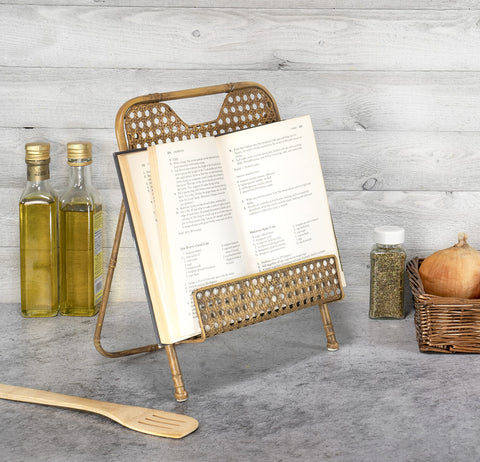 Red Co. cookbook stand in kitchen use for hands-free reading and protection.