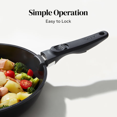 Redchef black detachable handle installed on cookware for secure, comfortable grip.