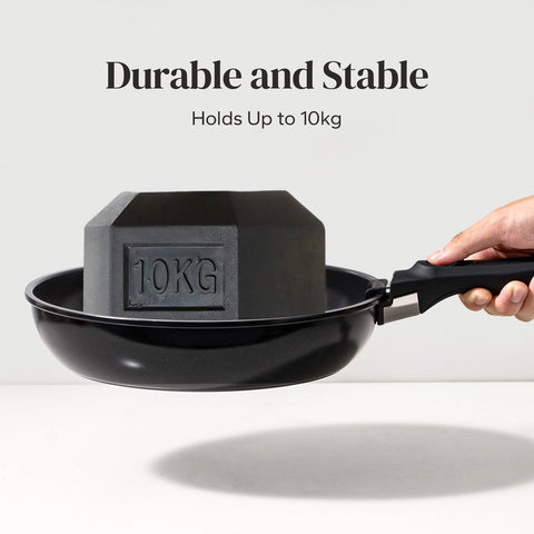 Redchef universal cookware handle beside pots highlights broad compatibility.