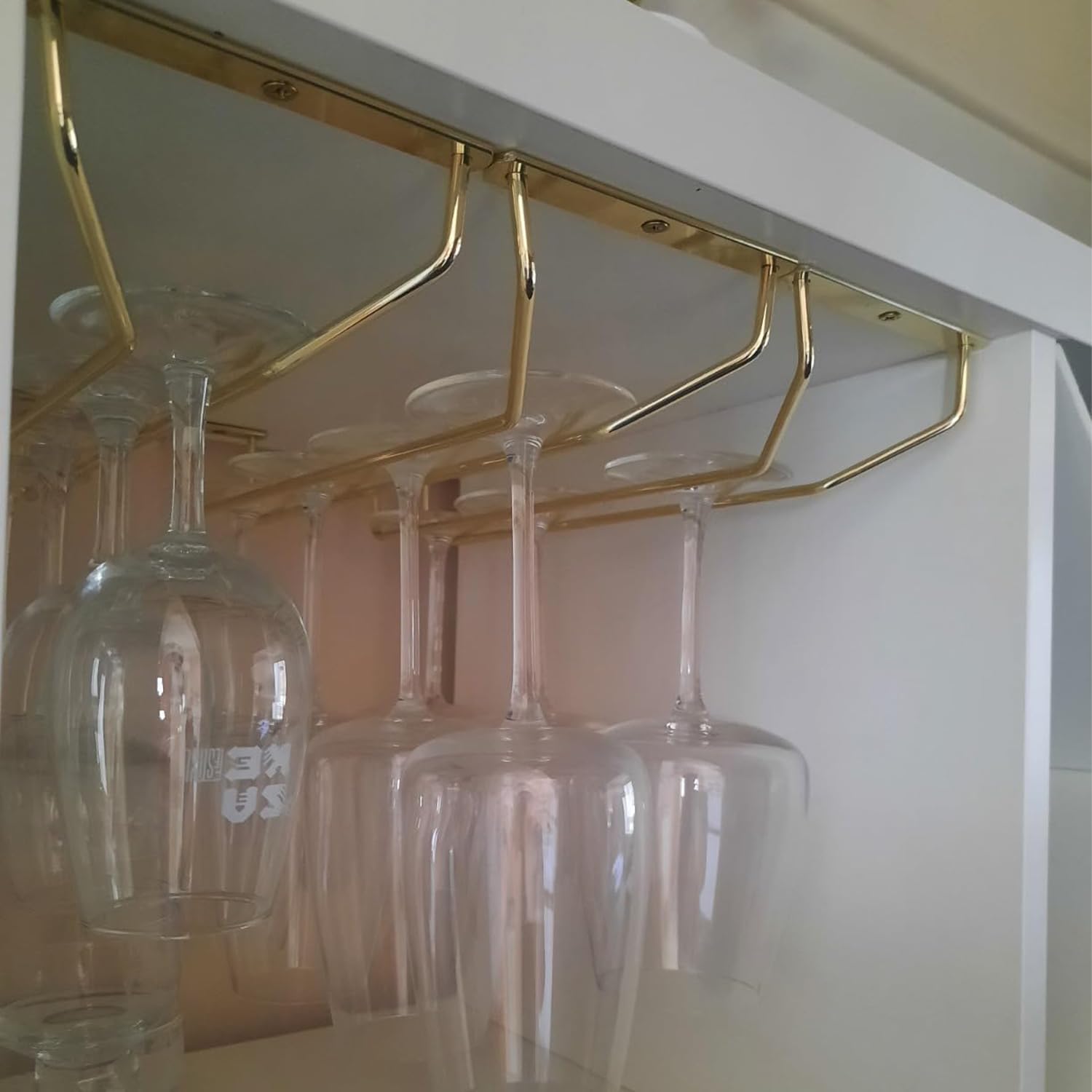 RedDreamer gold rack closeup highlights brass ends and durable construction.