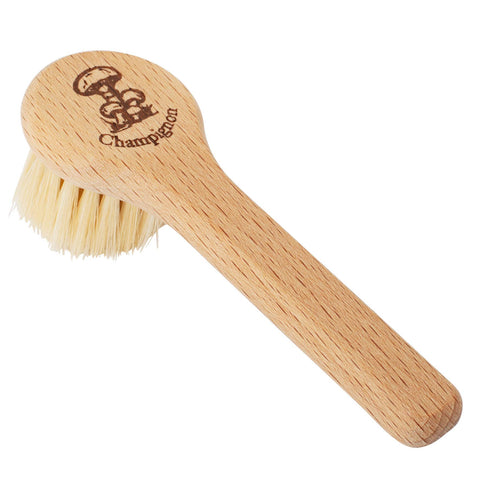 Redecker mushroom brush with natural pig bristle cleans mushrooms without water to preserve texture.