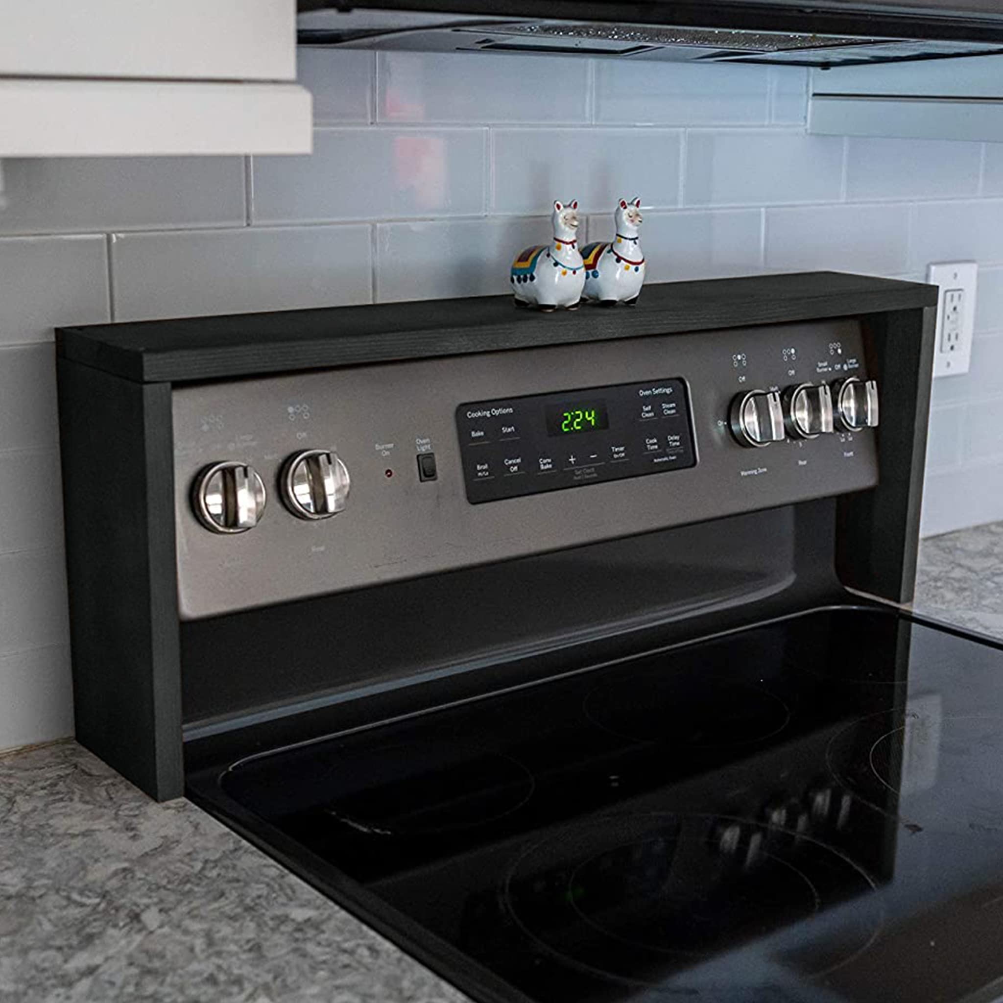 RELODECOR over-the-stove spice rack with ebony finish keeps spices within reach during cooking