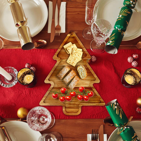 Renawe Christmas tree serving tray in acacia wood enhances festive cheese and fruit platters.