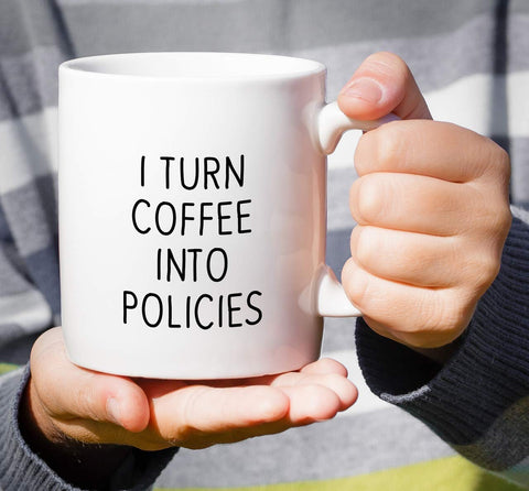 Retreez mug on a desk with a notebook; ideal coffee break companion.