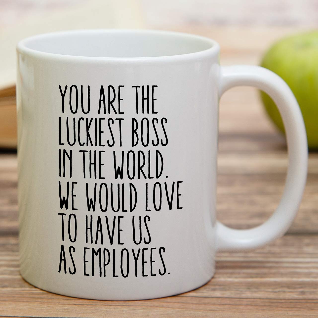 Retreez motivational mug held in hand during morning coffee ritual.