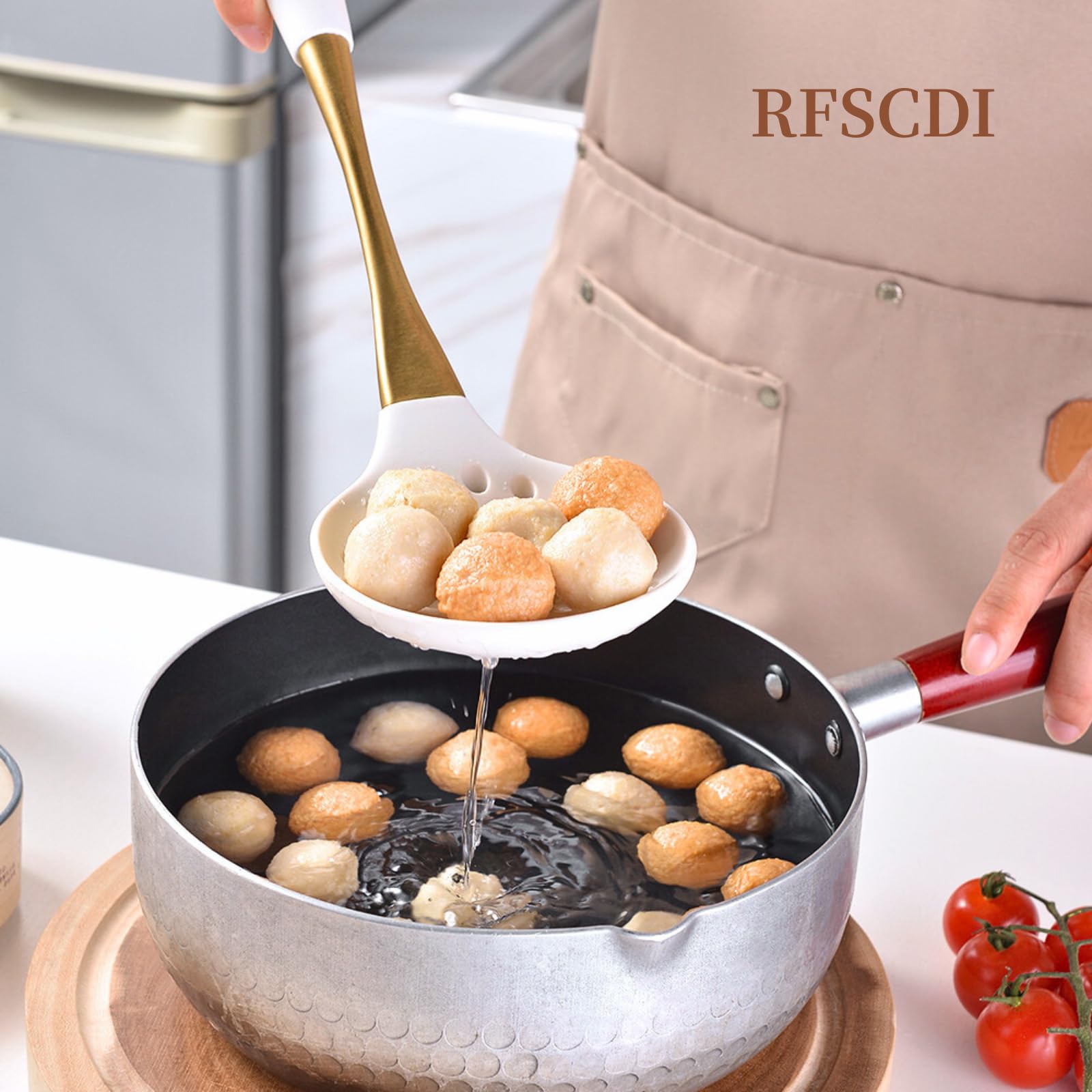 RFSCDI whisk blends batters quickly with heat-safe silicone core.