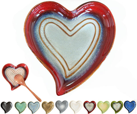 Rhobtyne heart-shaped ceramic spoon rest on stove top keeping spoons tidy
