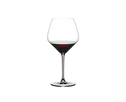 Riedel Extreme Pinot Noir glass on table showcases modern silhouette.