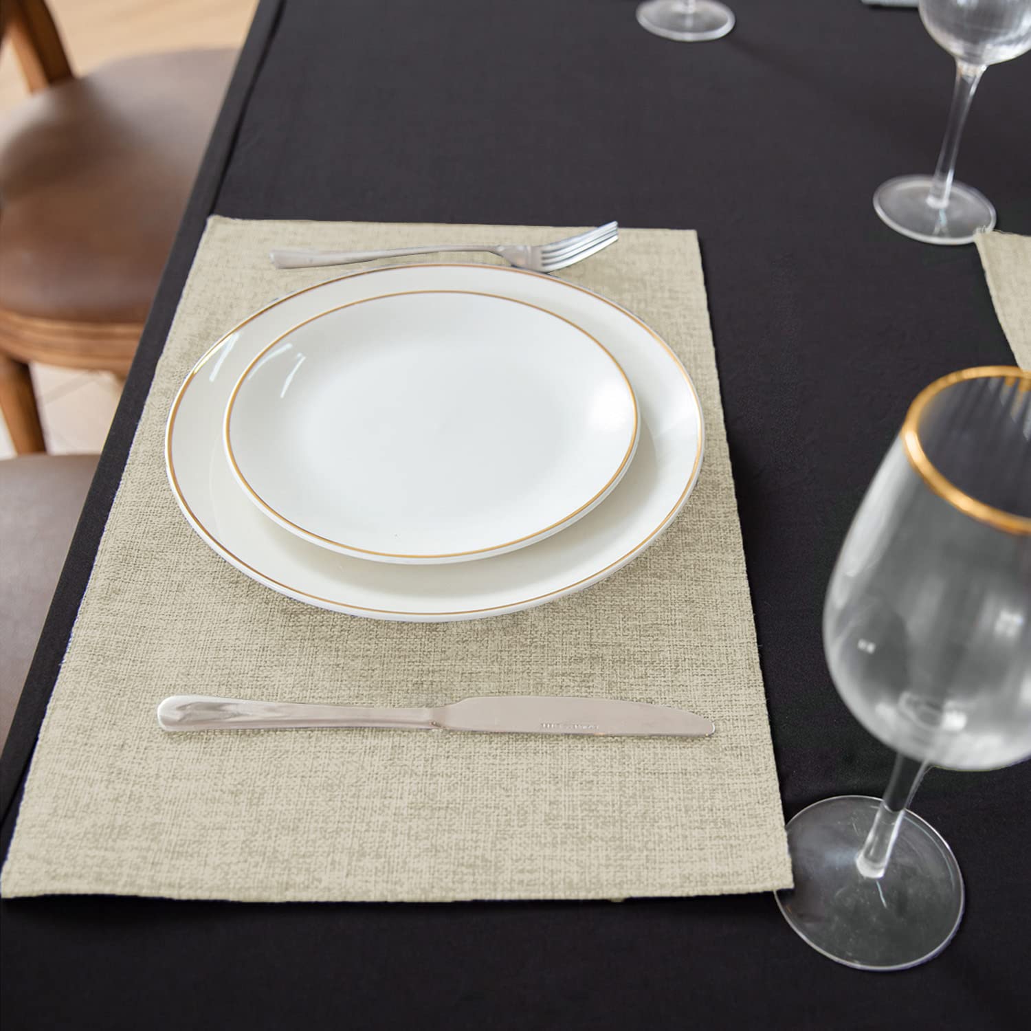 Rinpon wrinkle-free thick polyester placemats maintain a polished dining surface.