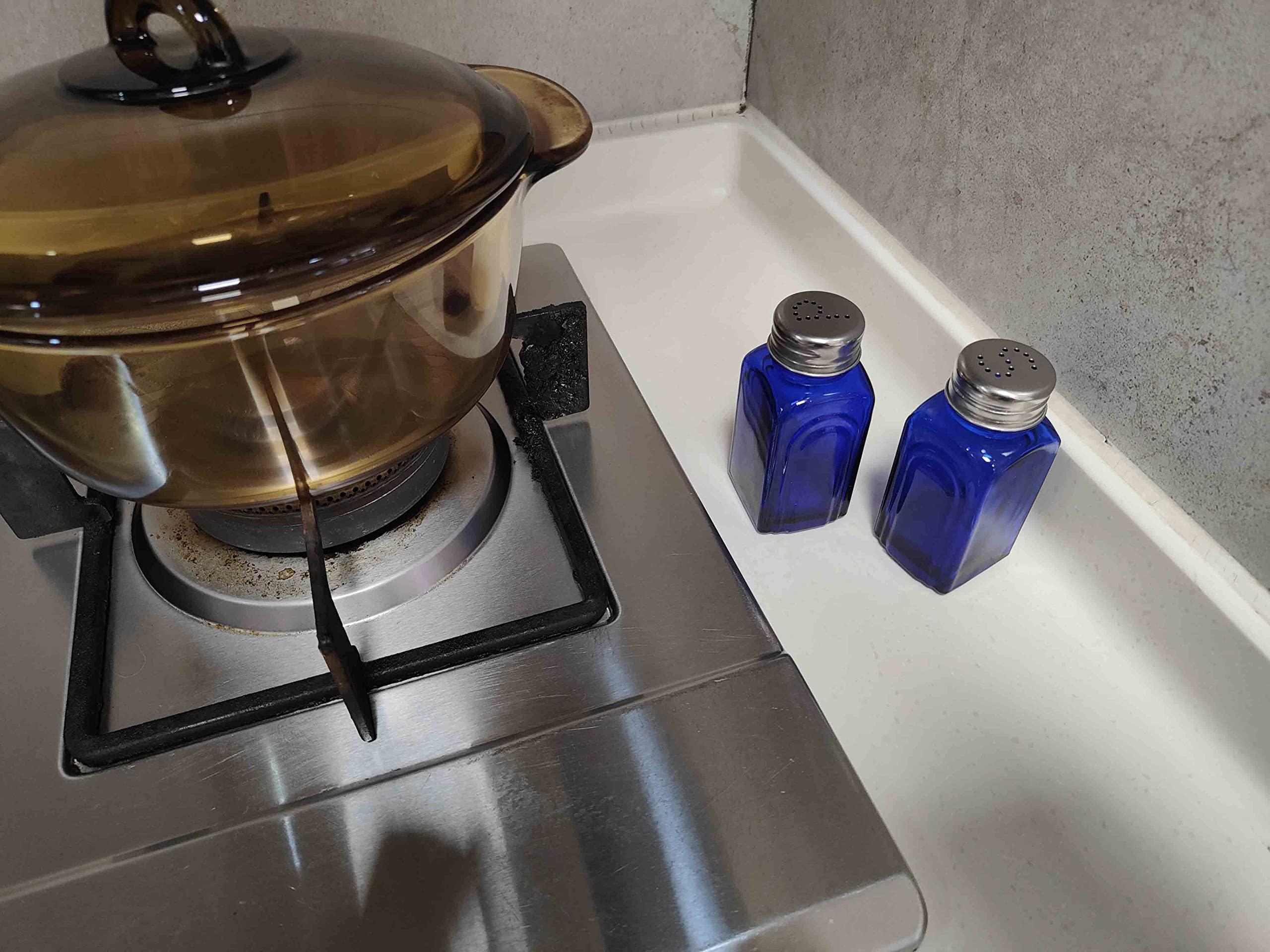 Ritadeshop retro kitchen decor shakers add vintage charm to countertops.