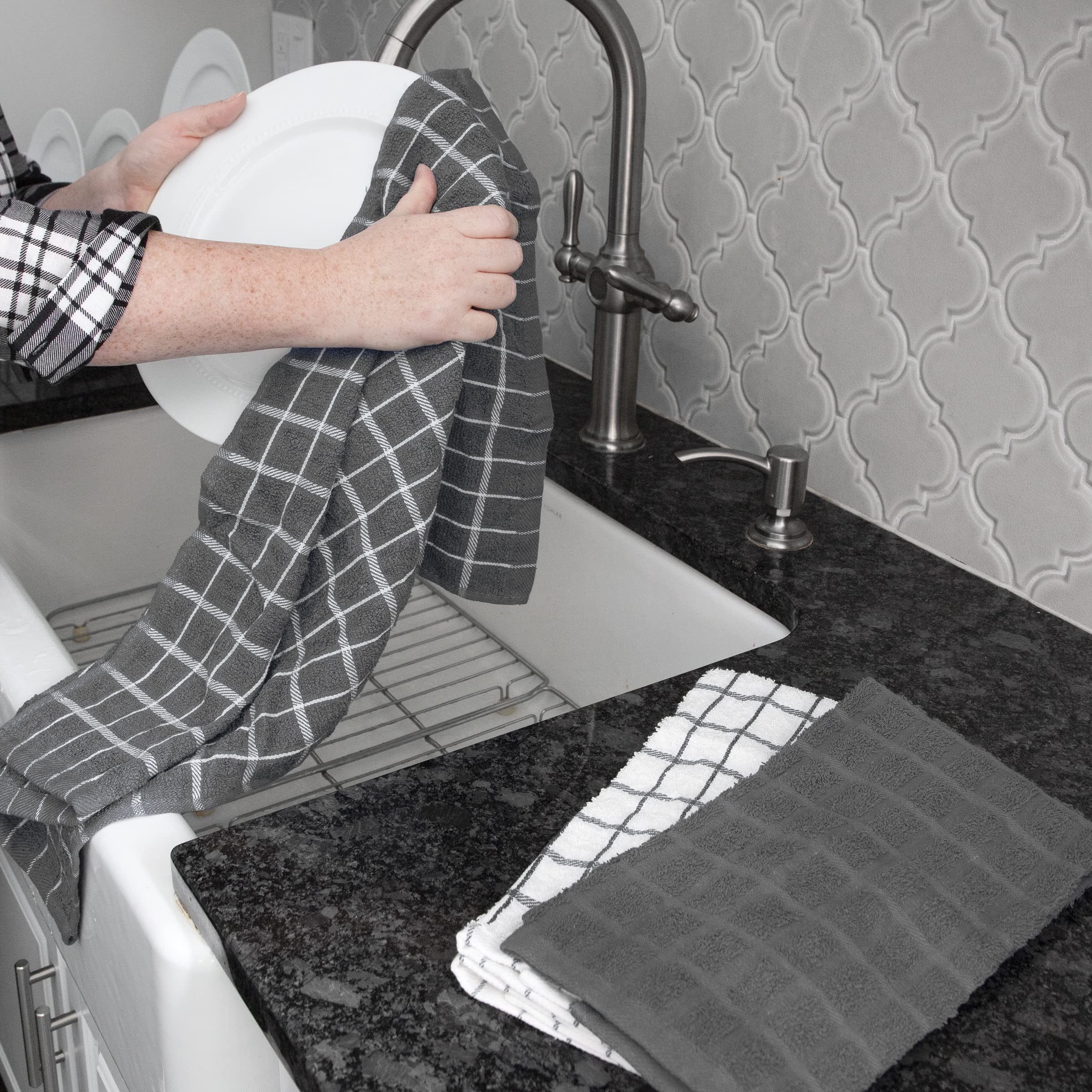 Ritz gray check towels flatlay highlights color options for a coordinated kitchen.