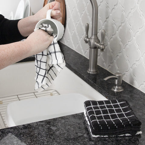 Ritz Premium dishcloths on countertop ready for quick spill cleanup.