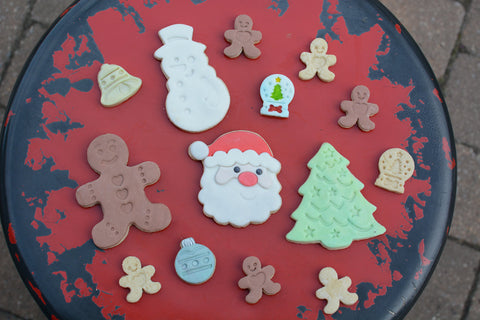 R&M Santa with mini bell stamper offers playful holiday shapes