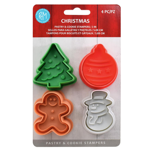 R&M Christmas tree stamper in use to create festive tree shapes on cookies