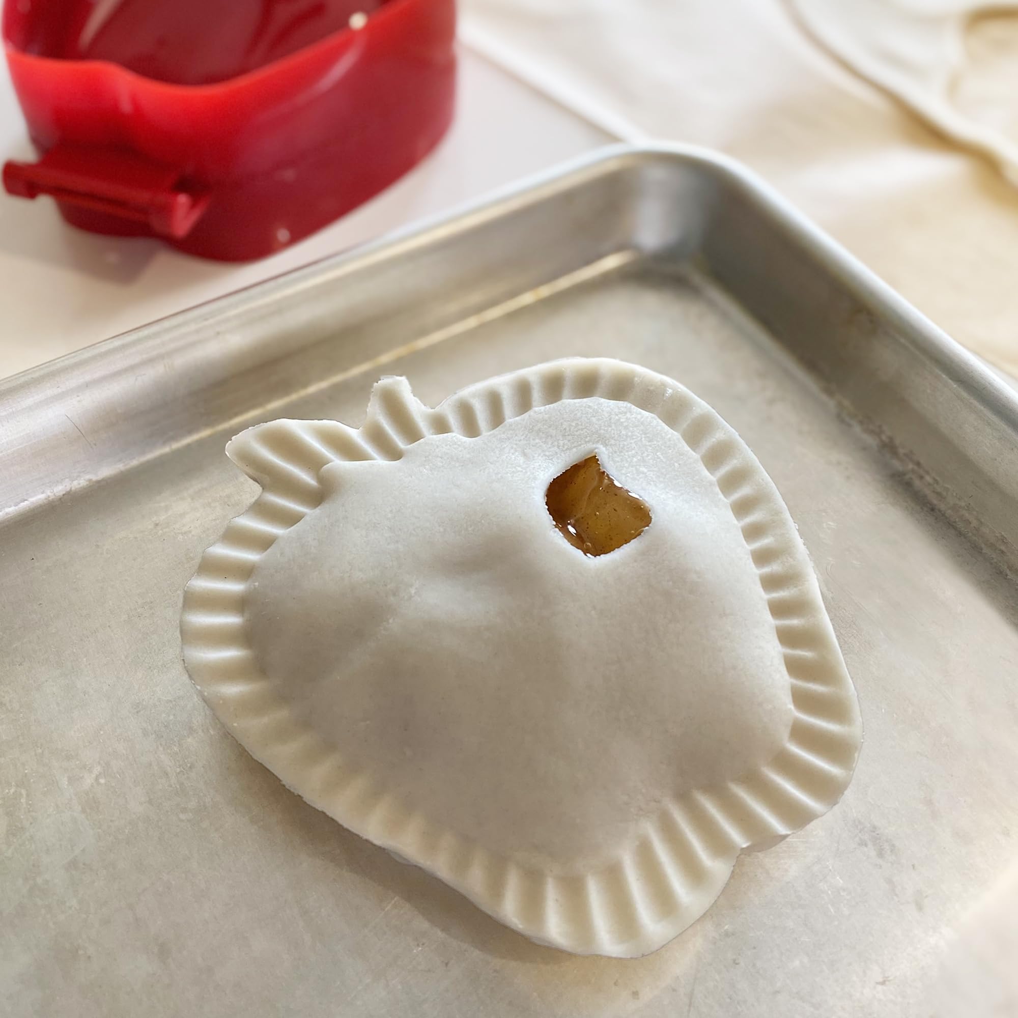 R&M Pocket Pie Maker compact storage on kitchen shelf.