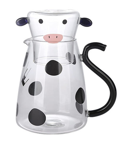 RockTrend cartoon cow clear glass carafe for bedside hydration.