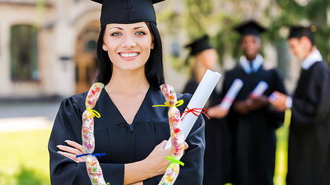 Rodudu Candy Lei Kit filling treats into tubing for personalized graduation favors.