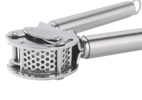 Rösle ginger press minced detail for fine texture in sauces and stir-fries.