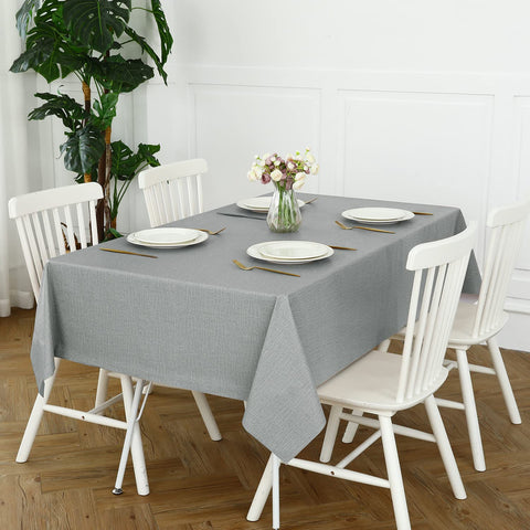 Romanstile stain-resistant vinyl tablecloth keeps furniture pristine.