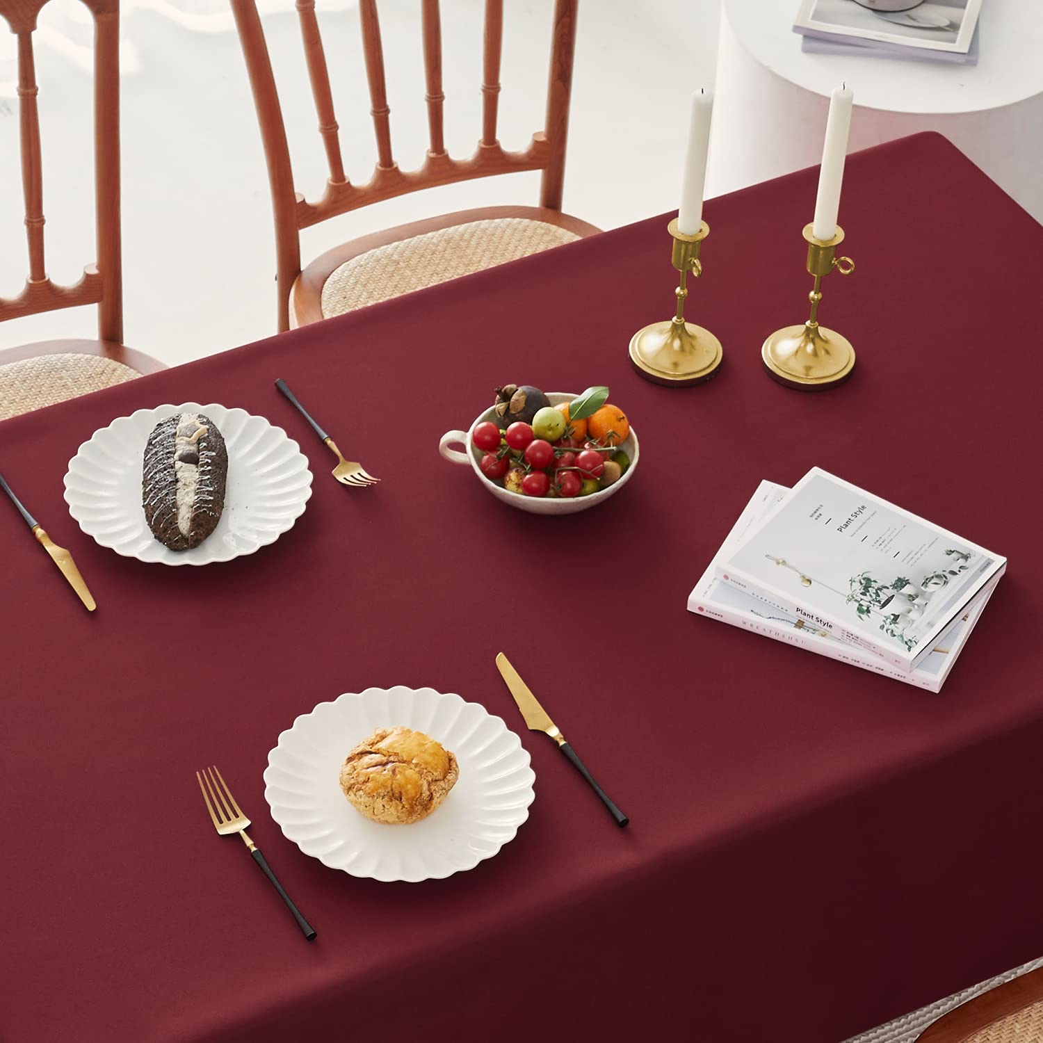 Romanstile wedding banquet setup with burgundy tablecloth for sophisticated ambiance