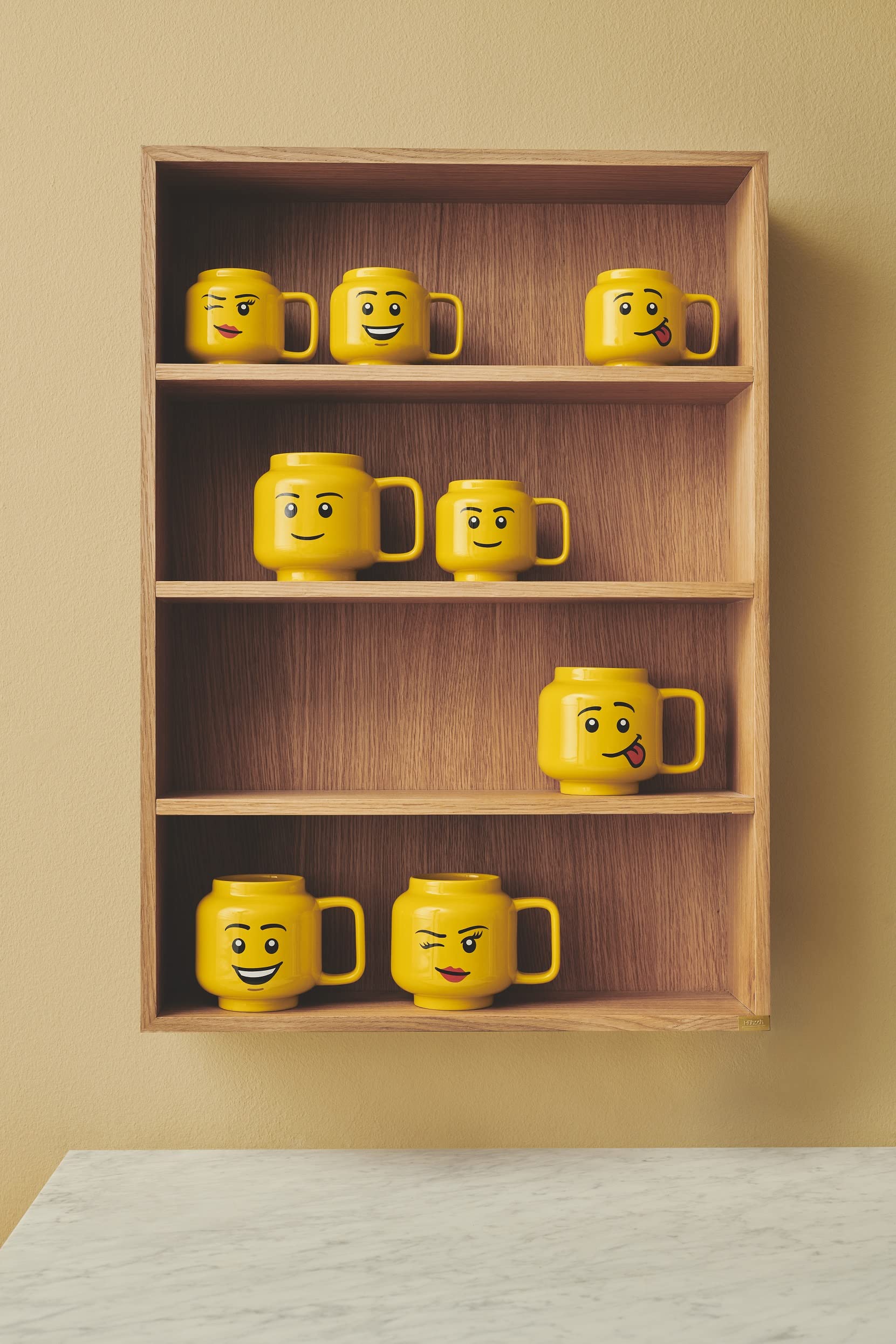 Room Copenhagen Lego mug side view highlights its iconic minifigure head.