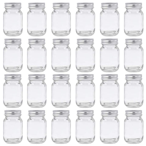 ROORUZ U Pack 2oz mason jar with silver lid; ideal for candles and honey storage.