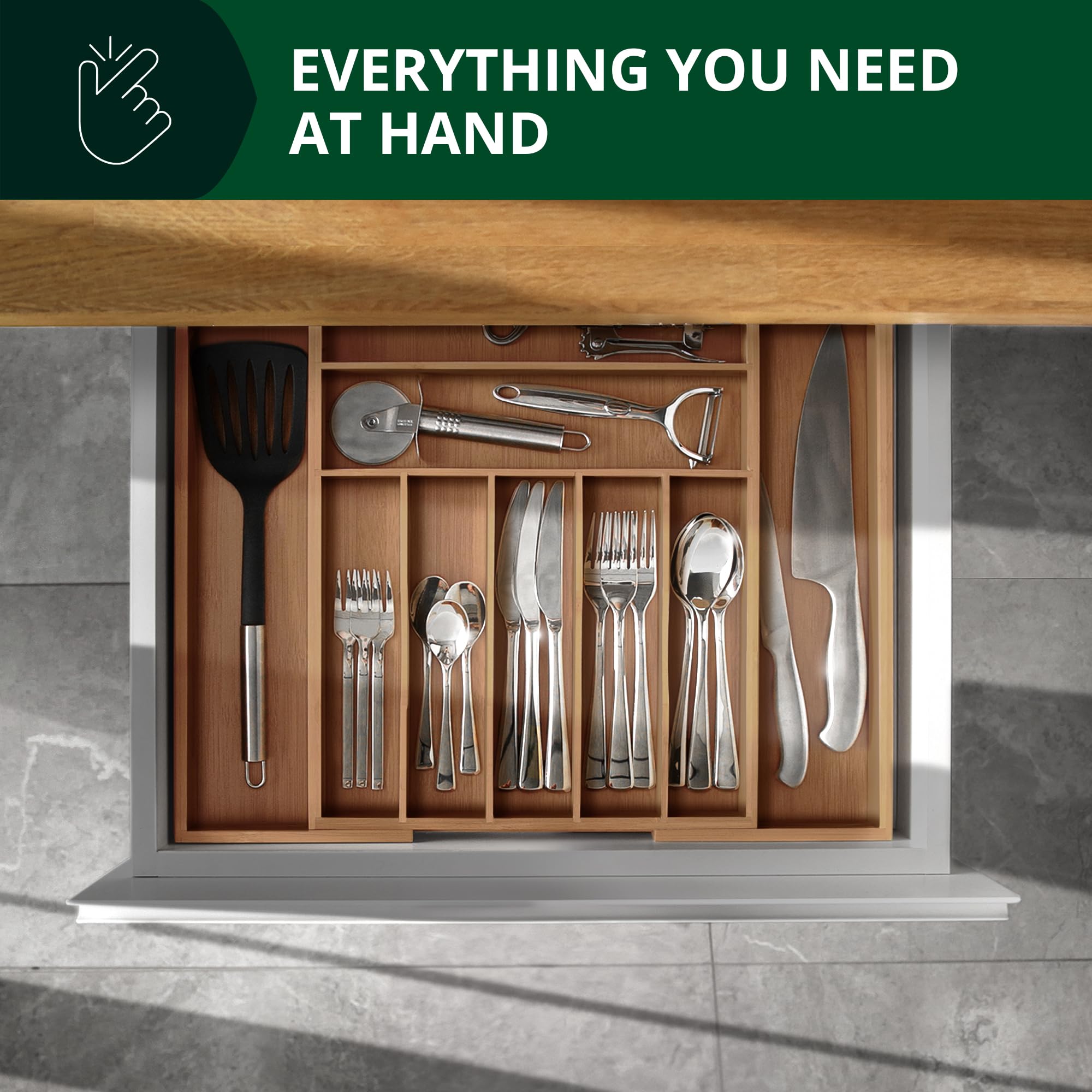 Royal Craft Wood expandable drawer system demonstrating adjustable size.