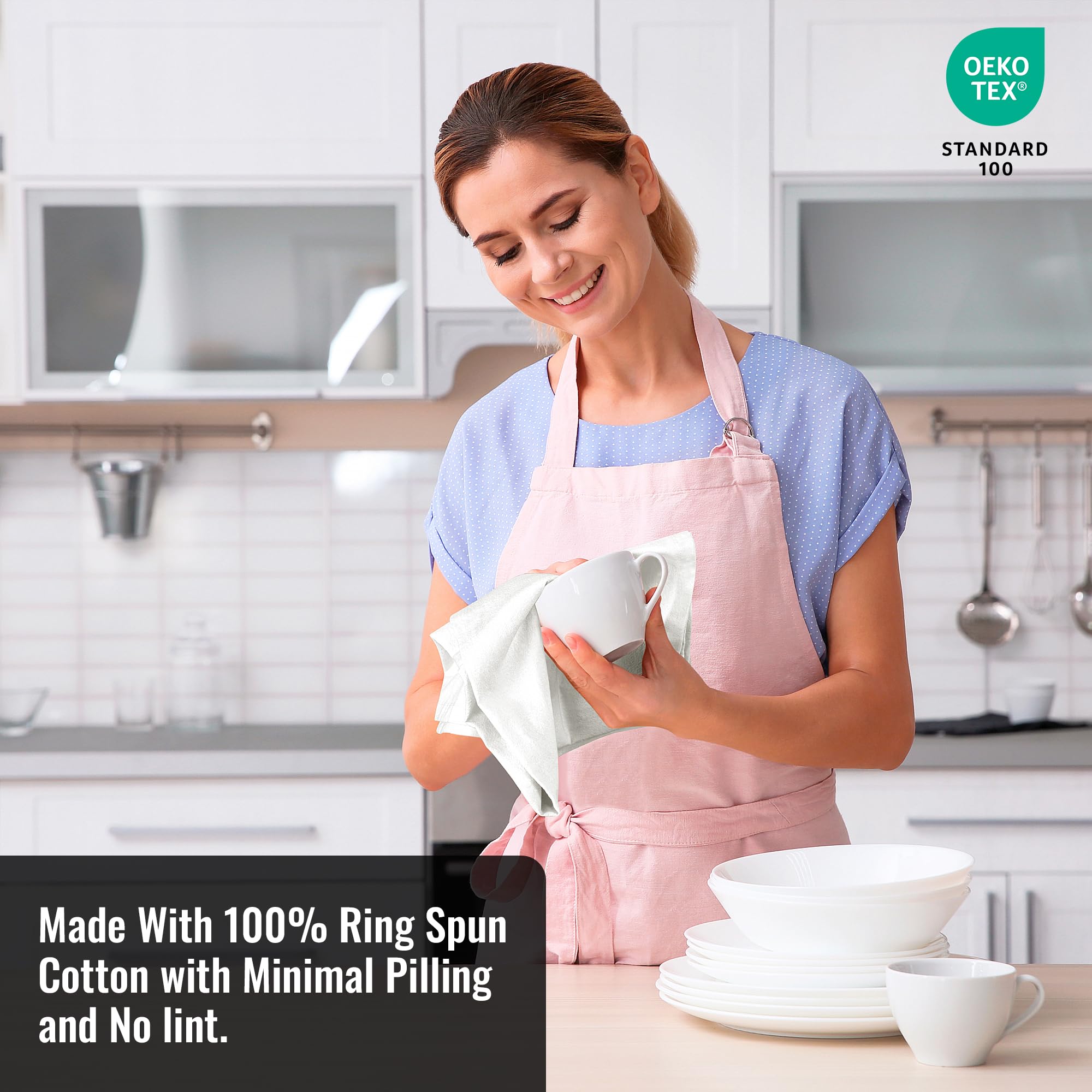 ROYALE LINENS flour sack towel cleaning windows, absorbent and lint-free for streak-free results.