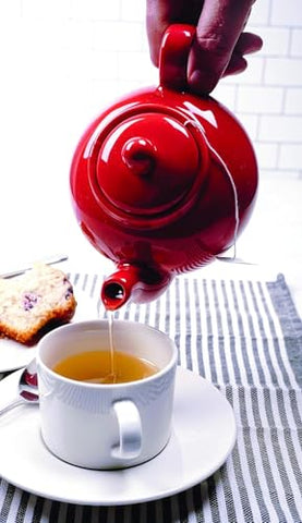 RSVP International red teapot with easy-to-clean glaze for quick cleanup.