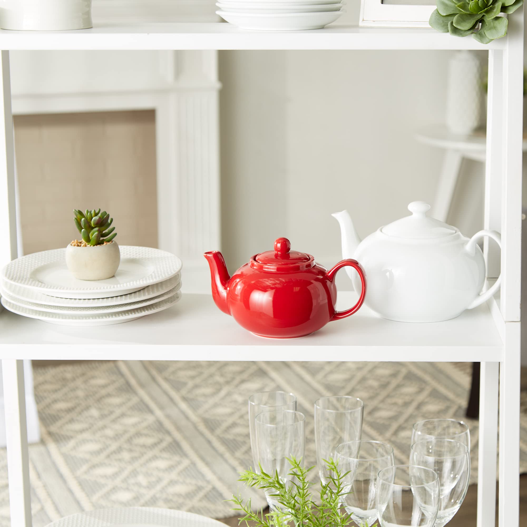 RSVP International red teapot emphasises microwave-safe convenience in modern kitchens.