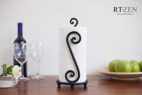 RTZEN matte black paper towel holder countertop stand shown on a clean kitchen surface