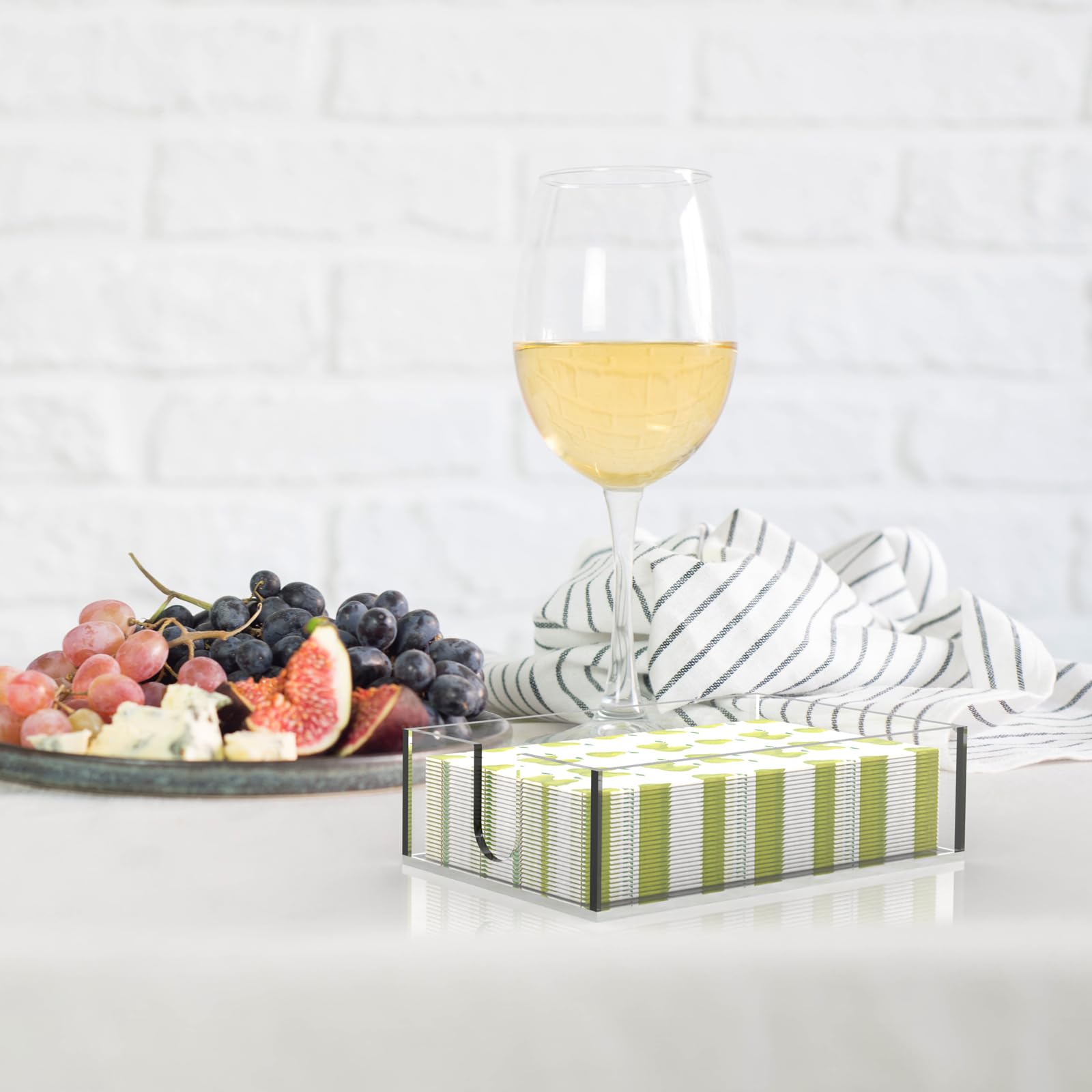 Rubtlamp hand towel tray keeps towels within reach on bathroom or kitchen surfaces.