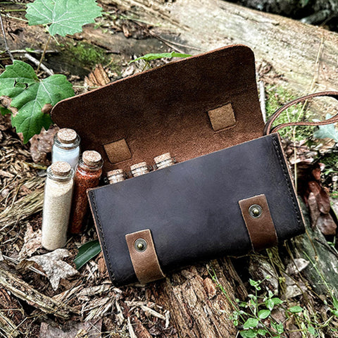 Ruck & River leather wallet transporting six corked vials securely