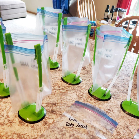 Efficient setup for organized fridge storage and quick bag filling.