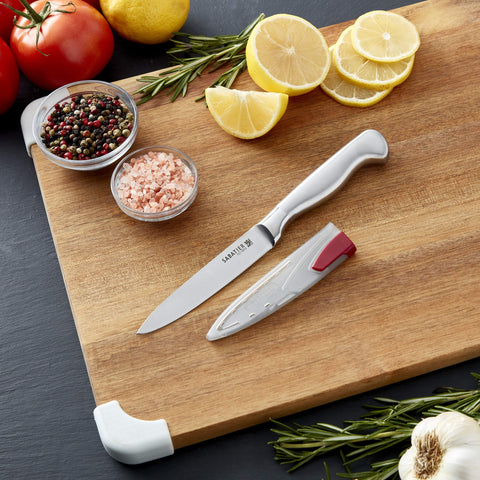 Sabatier EdgeKeeper knife with ergonomic handle provides secure grip during chopping.