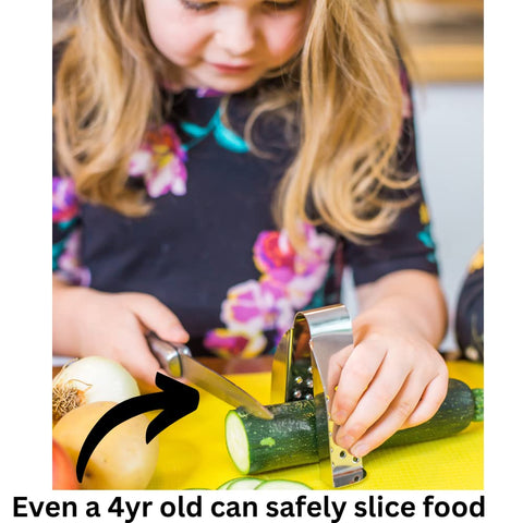 SAFEGRATE finger guard securing fruits and vegetables while slicing.
