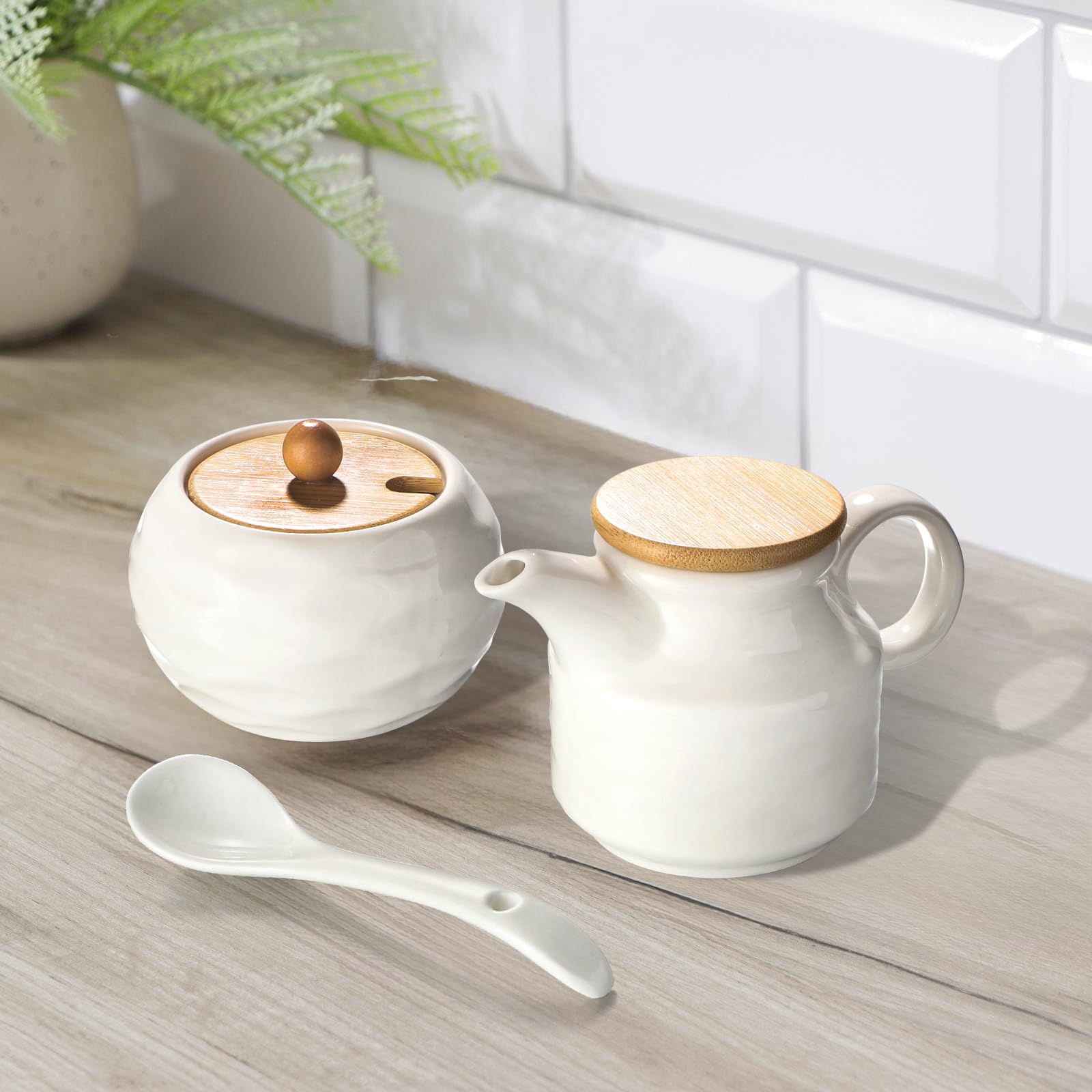 Sailench milk jug close-up highlights glossy glaze and smooth pour.