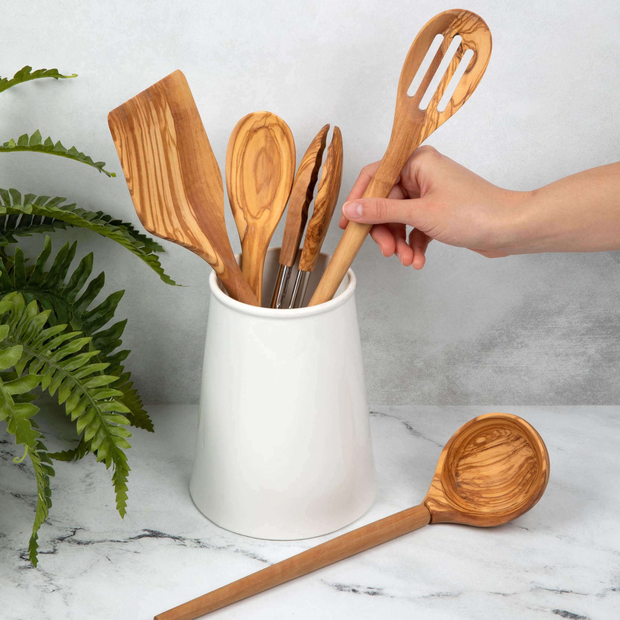 Salt & York olivewood slotted spoon designed to drain liquids cleanly.