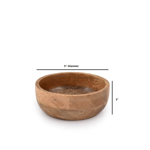 Samhita mango wood round bowl close-up showing natural grain and warm finish.