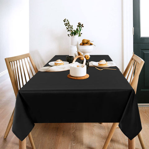 Sancua 2-pack black tablecloth on table, ideal for dining setups and easy cleaning.