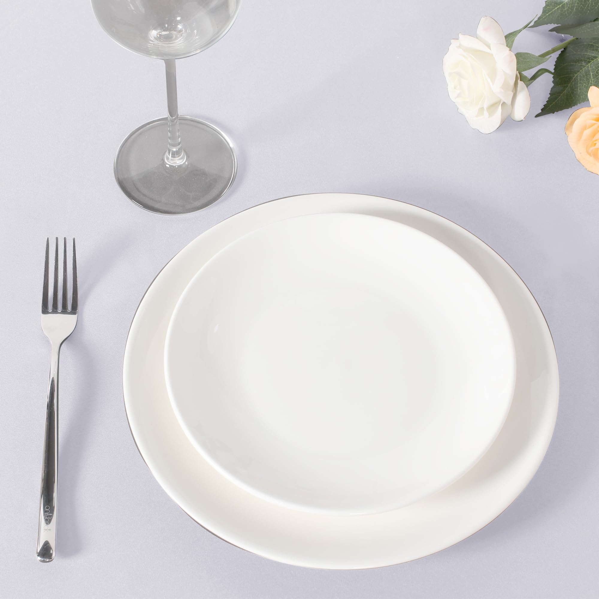 Sancua 90-inch round white tablecloth suitable for weddings and receptions.