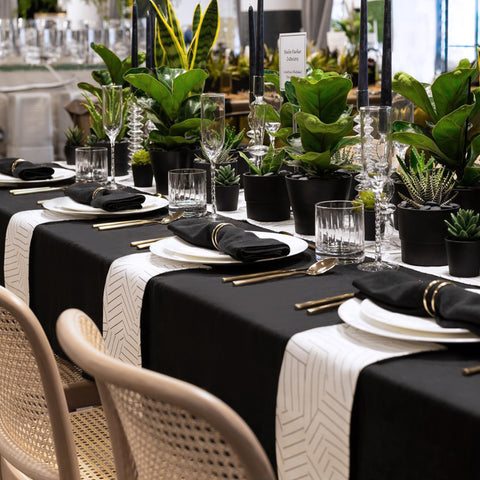 Sancua black tablecloth on dining scene suitable for events.