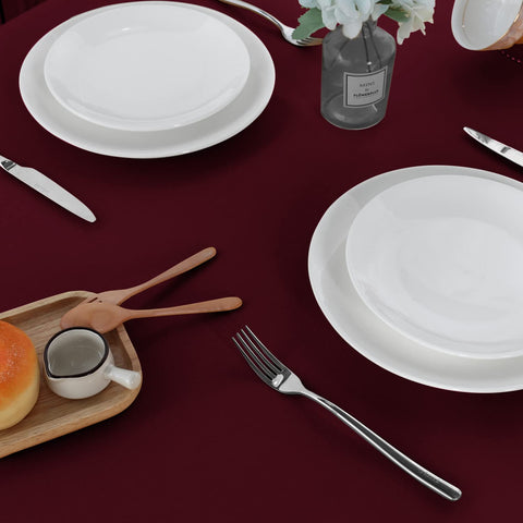 Sancua burgundy tablecloth at a buffet or dining setting, highlighting durability.