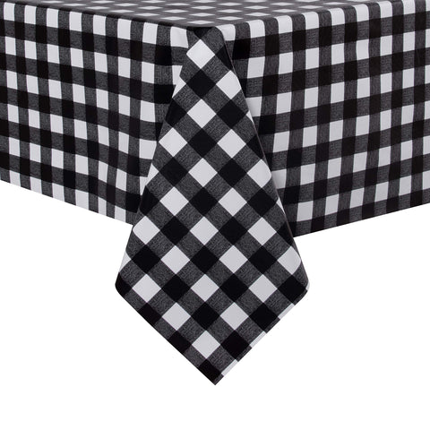 Sancua checkered tablecloth in black and white on a dining table, stylish surface protection.