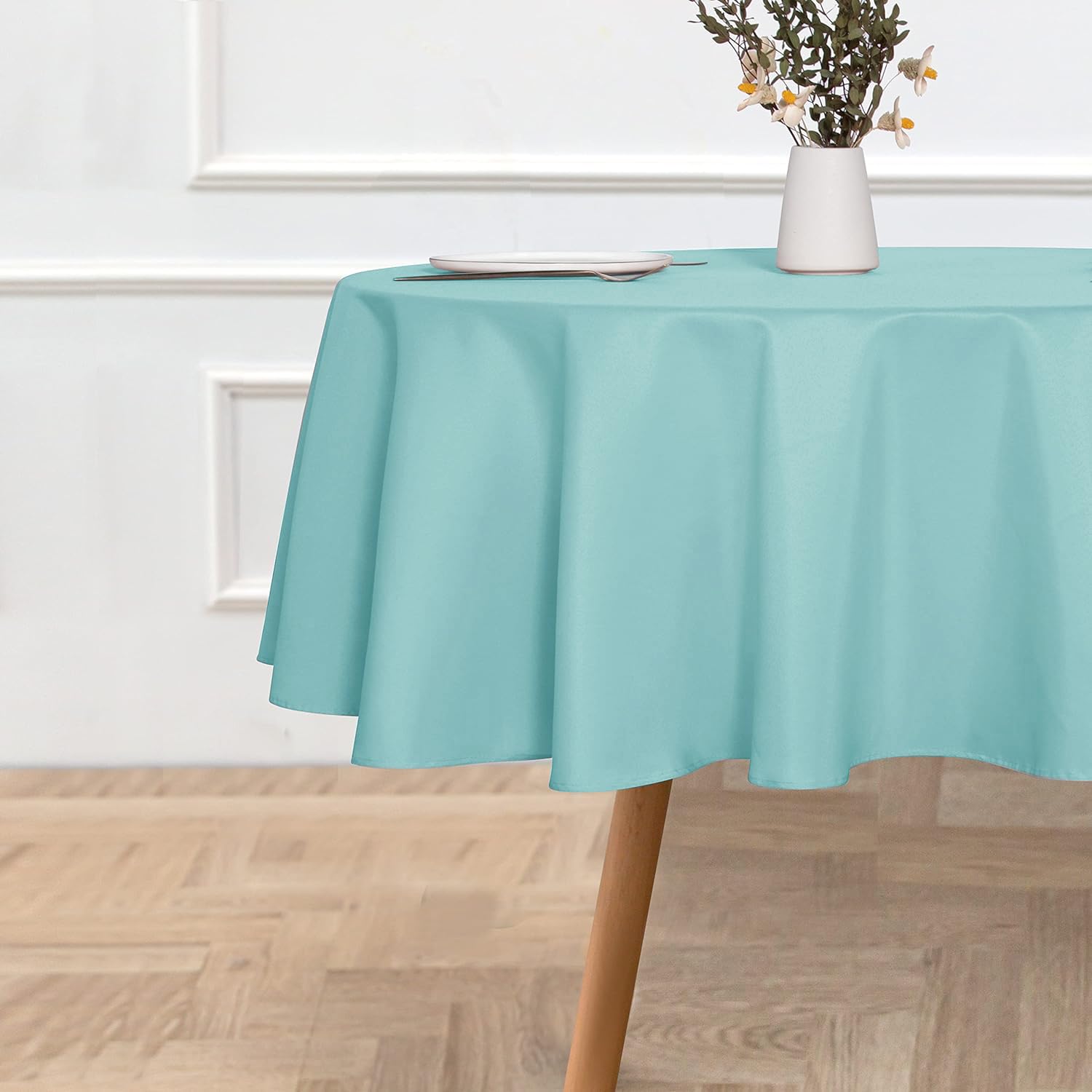 Sancua turquoise tablecloth on a buffet setup for a party.