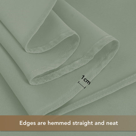 Hemmed edges of the Sancua tablecloth provide a polished look.